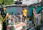 Kompak,-TNI-dan-Polisi-Bakti-Religi-Sambut-Hari-Bhayangkara-ke--79-Bersihkan-Makam-Pegirikan-Surabaya