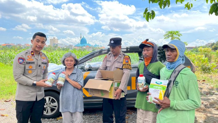 Polsek-Taman-Salurkan-Bibit-dan-Pupuk-untuk-Dukung-Lahan-Jagung
